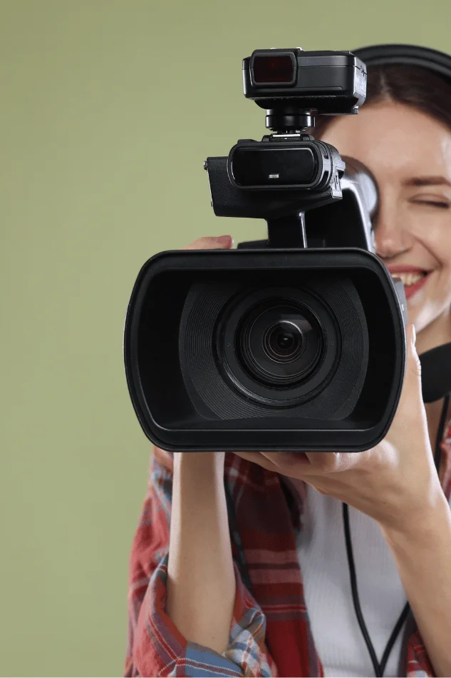 Person recording with a large video camera