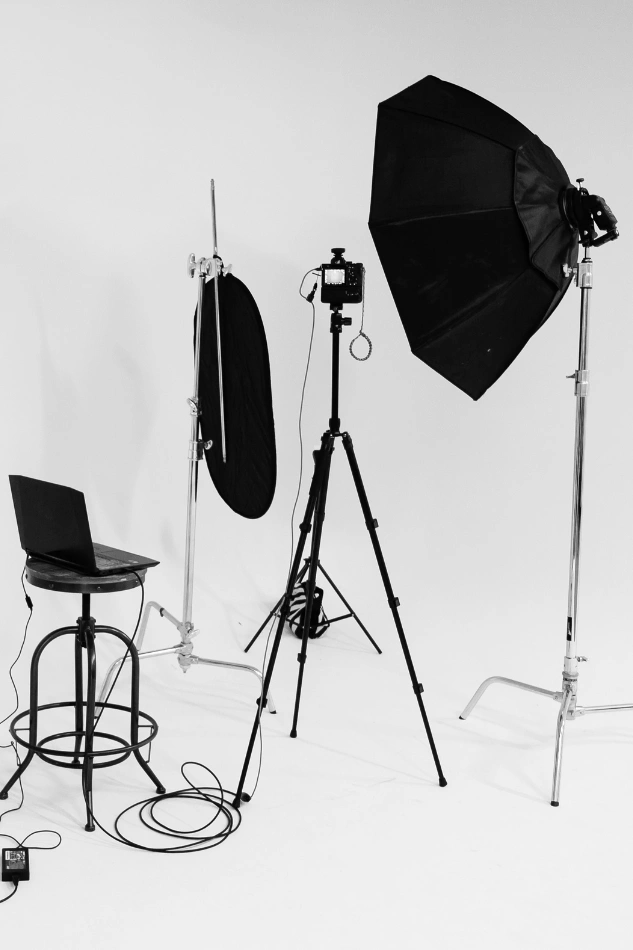 Studio setup with lights, tripod, and camera for a business photography session