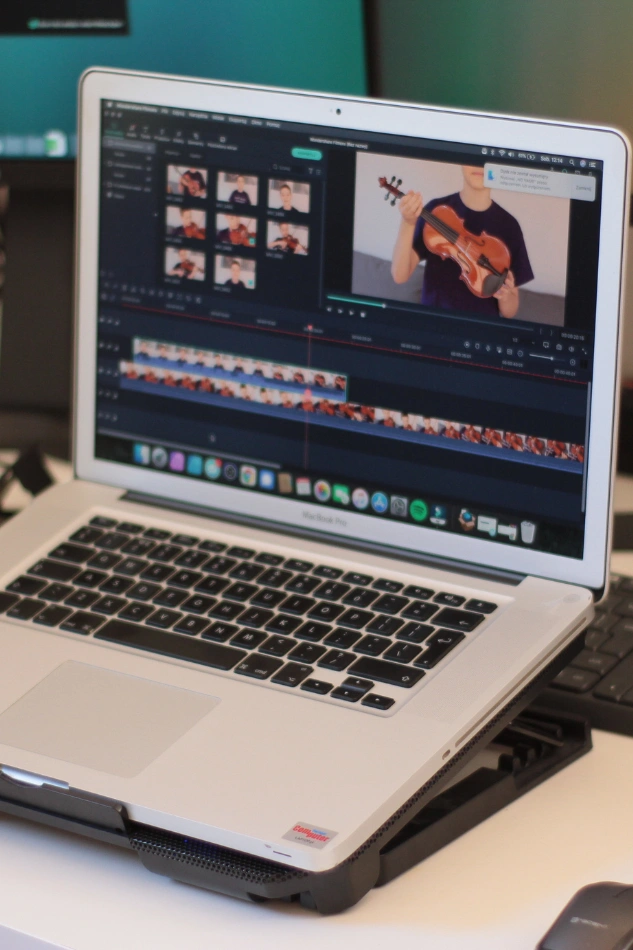 Editing brand videos using professional software to highlight product features and boost engagement.